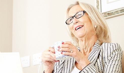 Resident relaxing in apartment - Westward Care