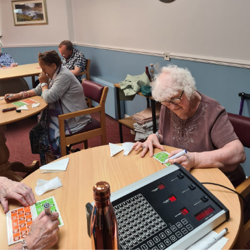 Residents playing bingo at Pennington Court