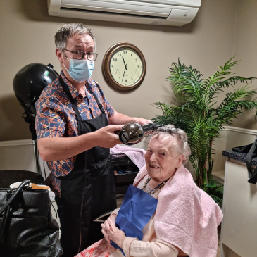 Residents having a bit of pampering from Steve our hairdresser.