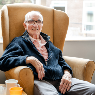 Pennington Court resident in armchair