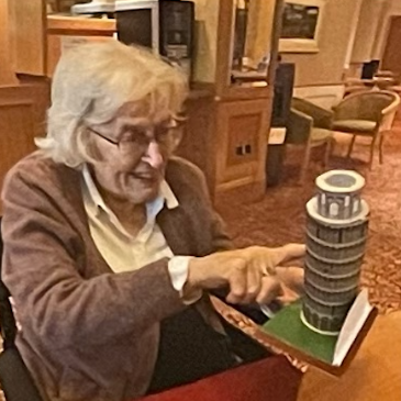 Resident at Headingley Hall visits a mini Leaning Tower of Pisa for International Week