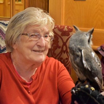 Resident holding bird of prey