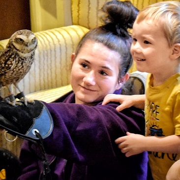 Montessori visitor joins in the fun with the birds