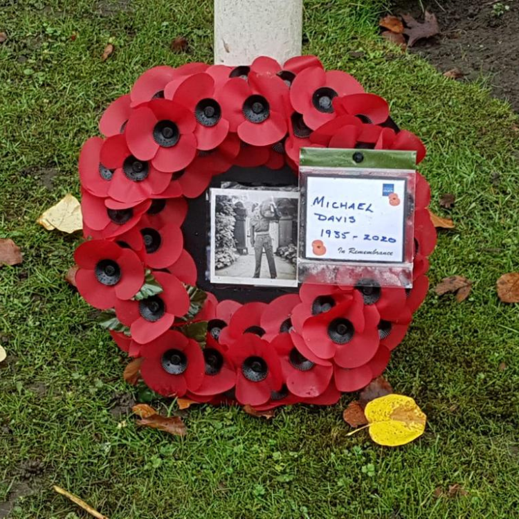 Laying a wreath for Michael David